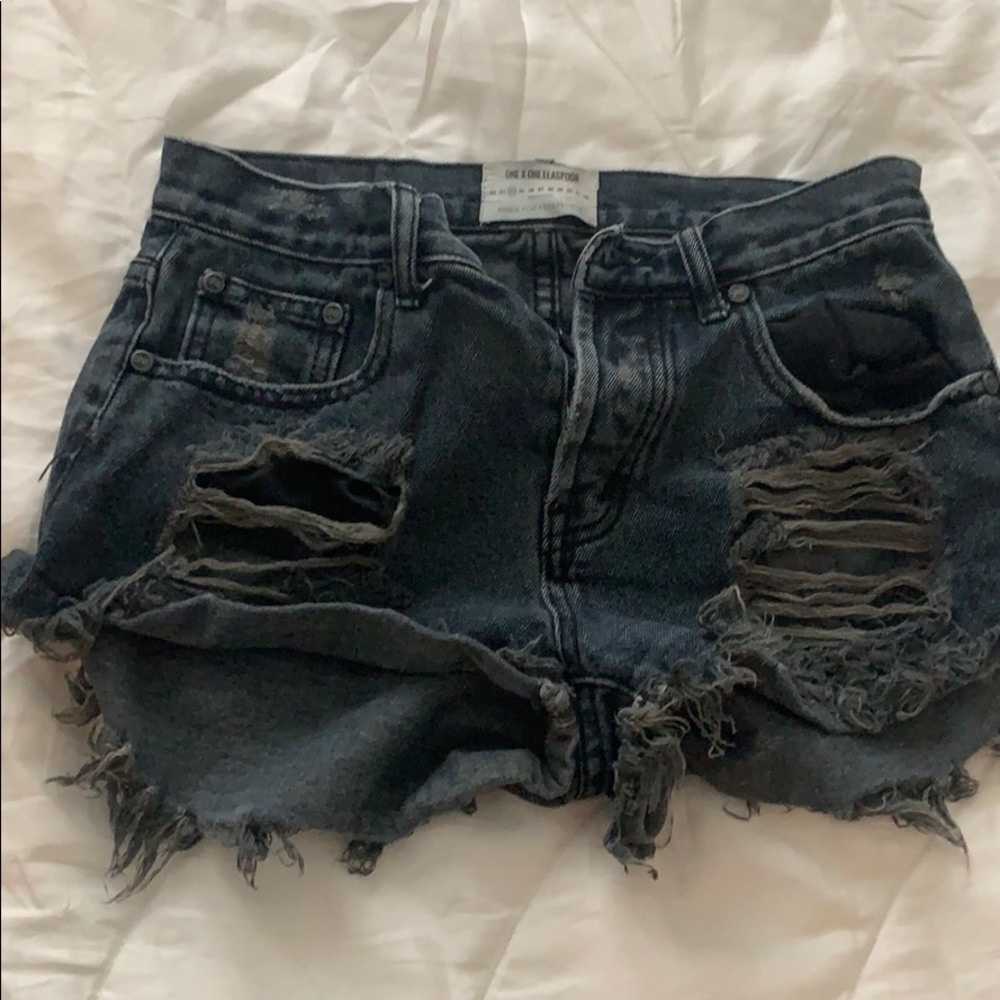 Distressed high rise denim shorts
